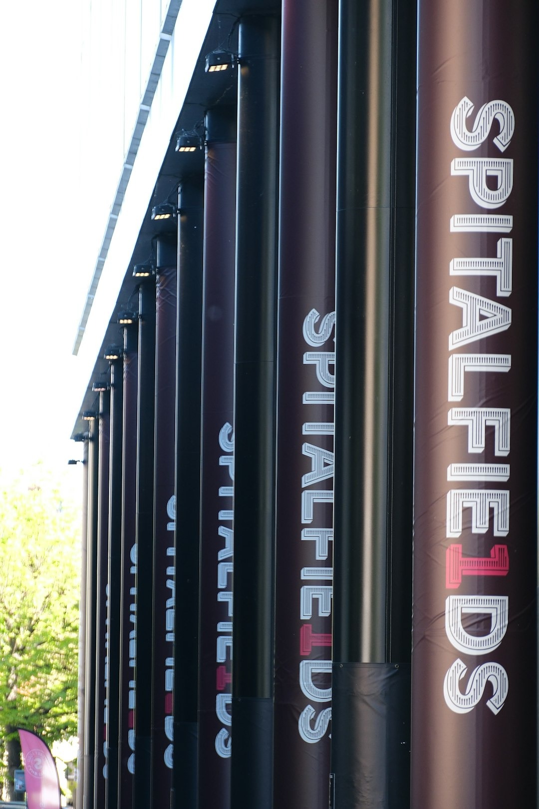 Row of pillars with "spitalfields" text